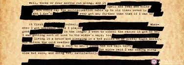 Heavily redacted typewritten page