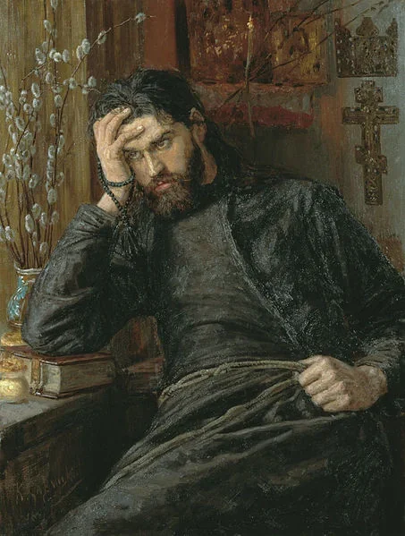 Oil painting: a monastic figure in a black cassock seated brooding before icons and an Orthodox cross, prayer rope in hand. Depicts: Alyosha (Alexey) Karamazov.